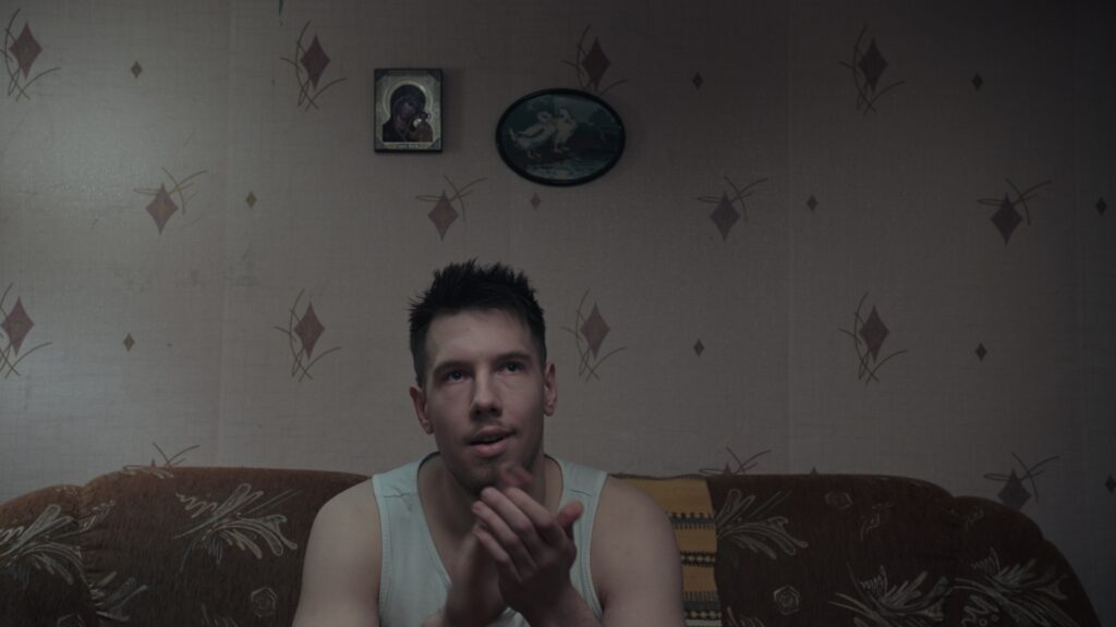 Screencap from the movie You Shouldn't Play Alone, displaying the cold and desolated environment of winter Estonia in the Russian comunity, and the life of Anna and Jevgeny and their troubled relationship