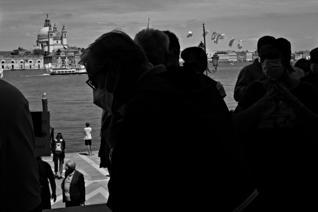 People on the votive bridge during the redentore celebrations in Venice